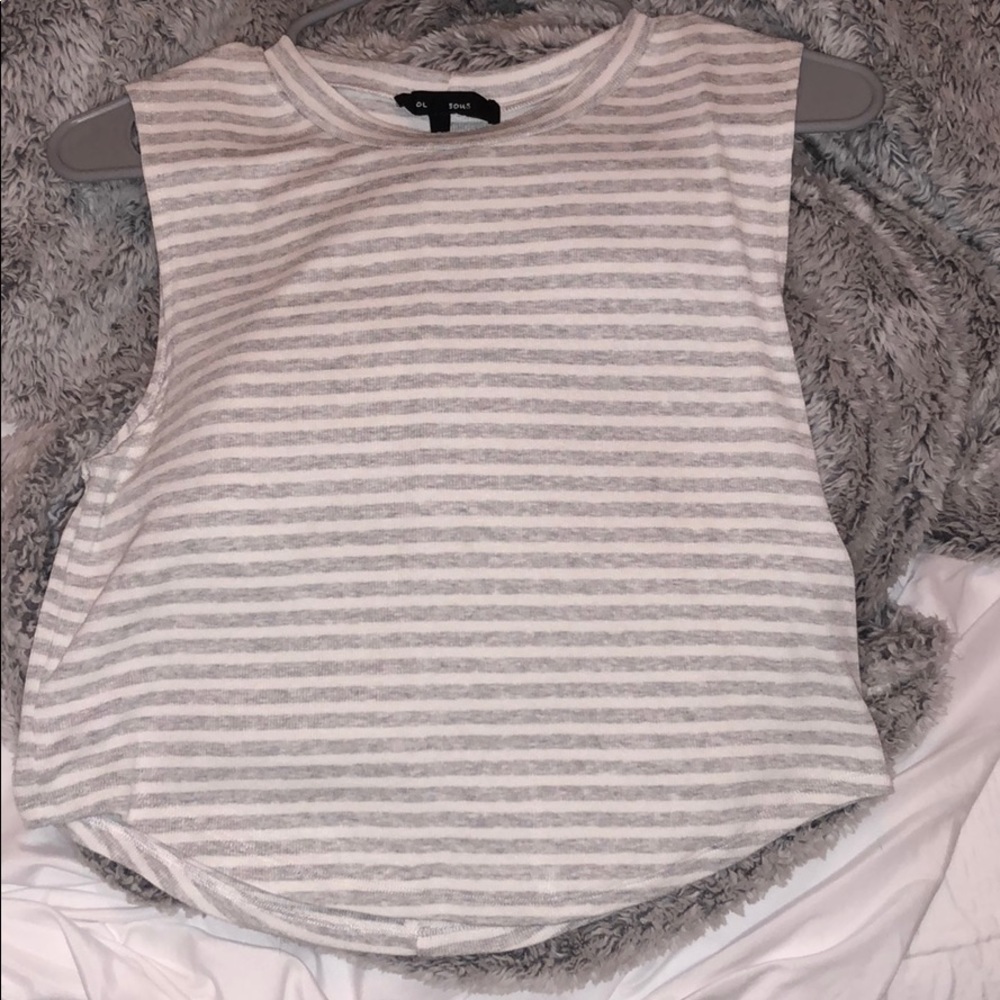 I am selling this grey and white strip crop top!